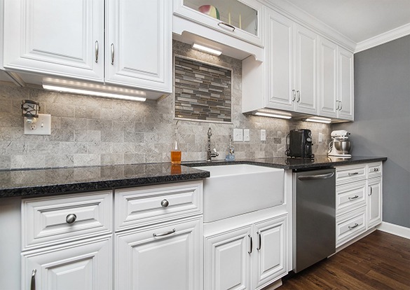 raised panel kitchen cabinets with wood finish in Tampa Bay