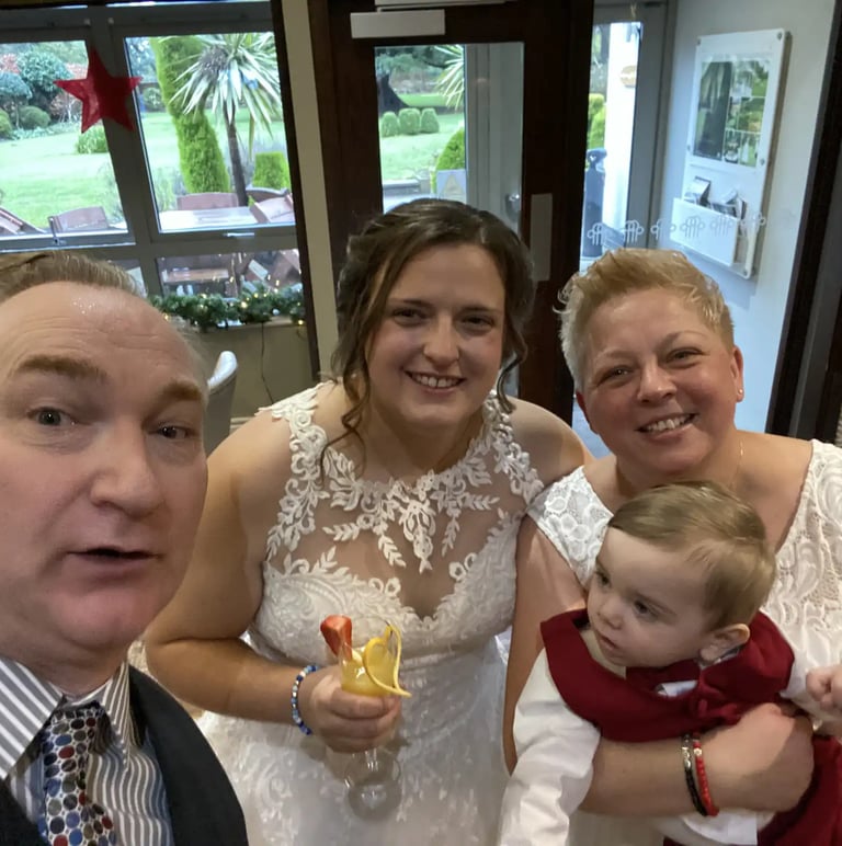 Warm wedding ceremony led by celebrant David Allbutt in Manchester, creating a personal and bespoke moment for the couple.