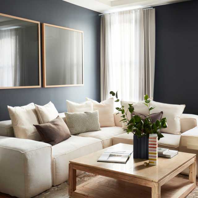 a living room with a couch and a coffee table