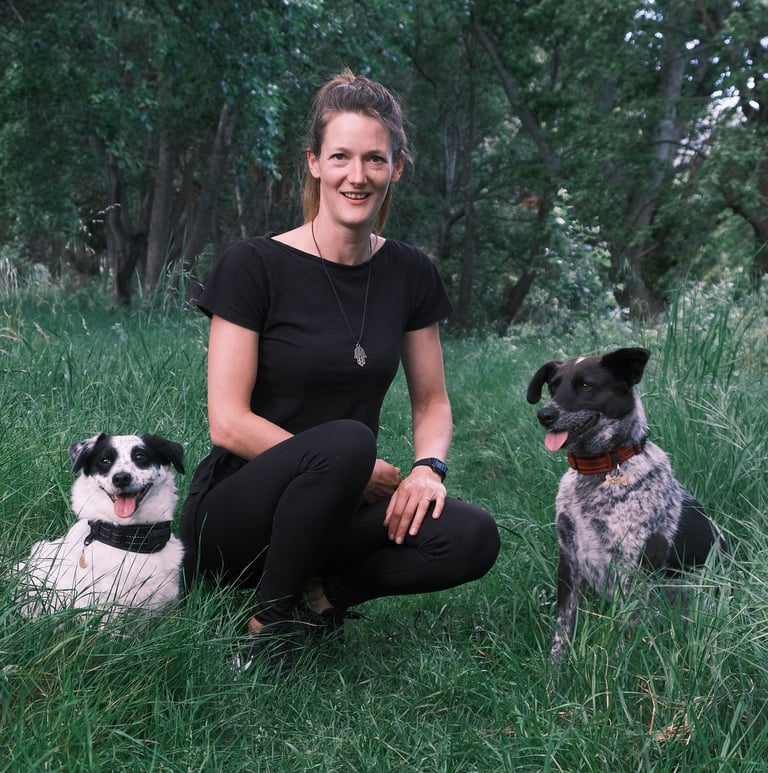 Cape Town dog trainer Isabell with her two dogs
