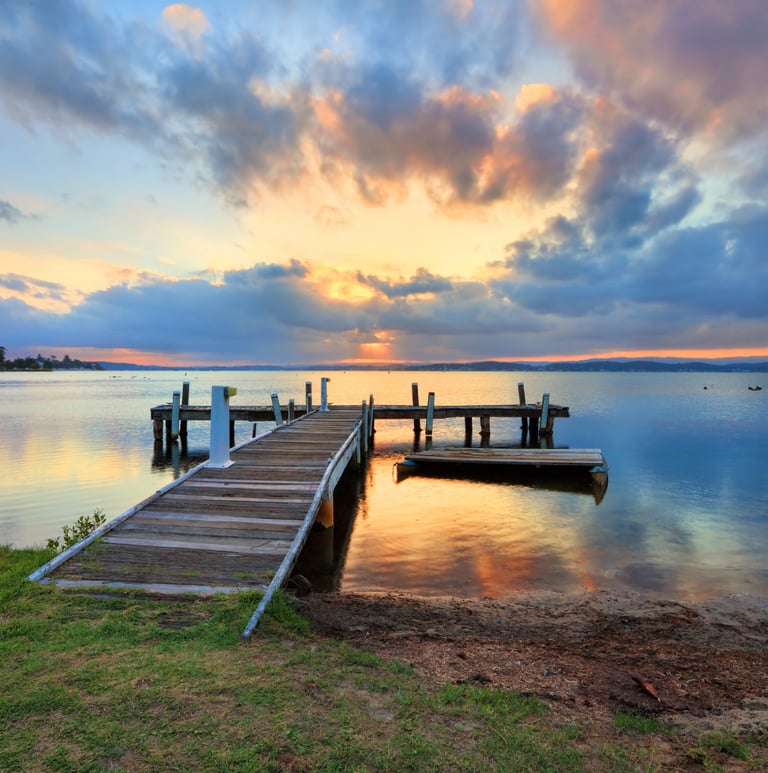 a dock with a dock and a boat in the water