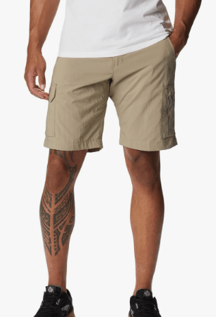 a man with tattoos on his leg and a tattoo on his leg