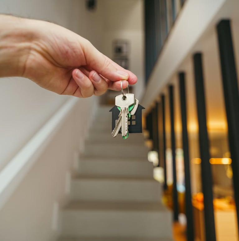 a person holding a keychaik with a keychaik