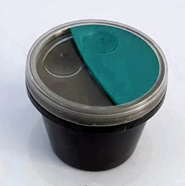 Final product of injection molded disposable sauce container, designed by Koorosh Shojaei, 2