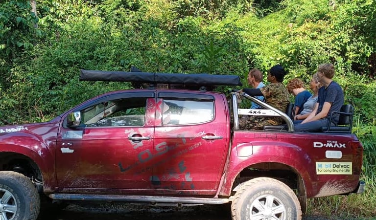 A local guide sharing his knowledge to visitors during the ongoing safari