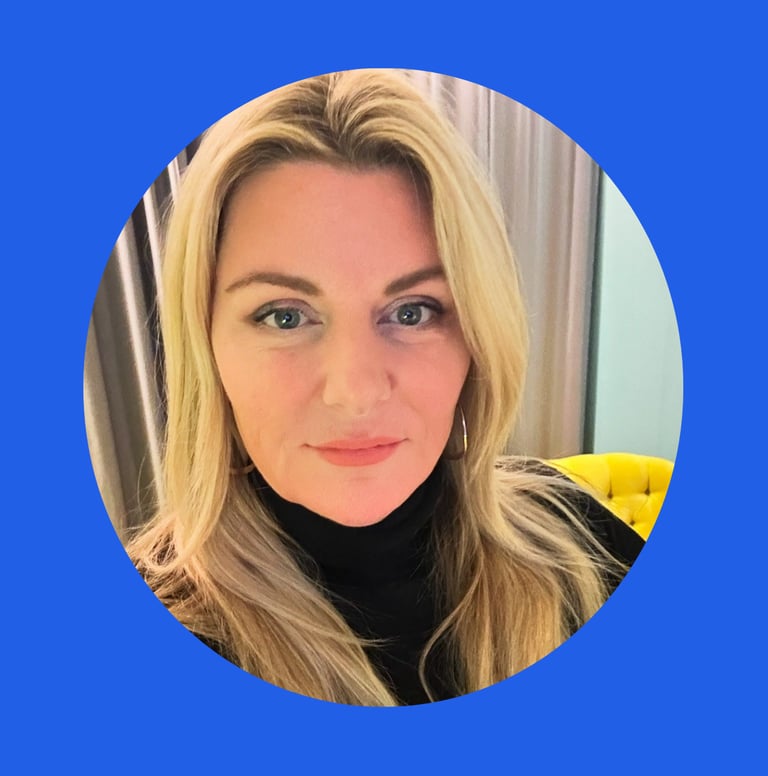 Claire is looking at the camera, with blonde hair and a black turtle neck top