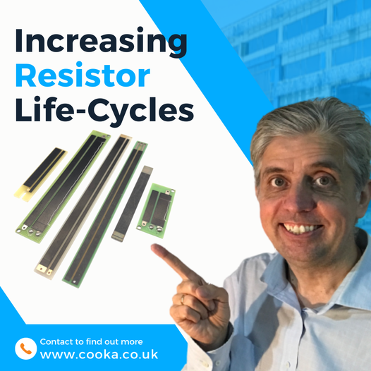 a man holding a piece of circuit board with a circuit of circuiting