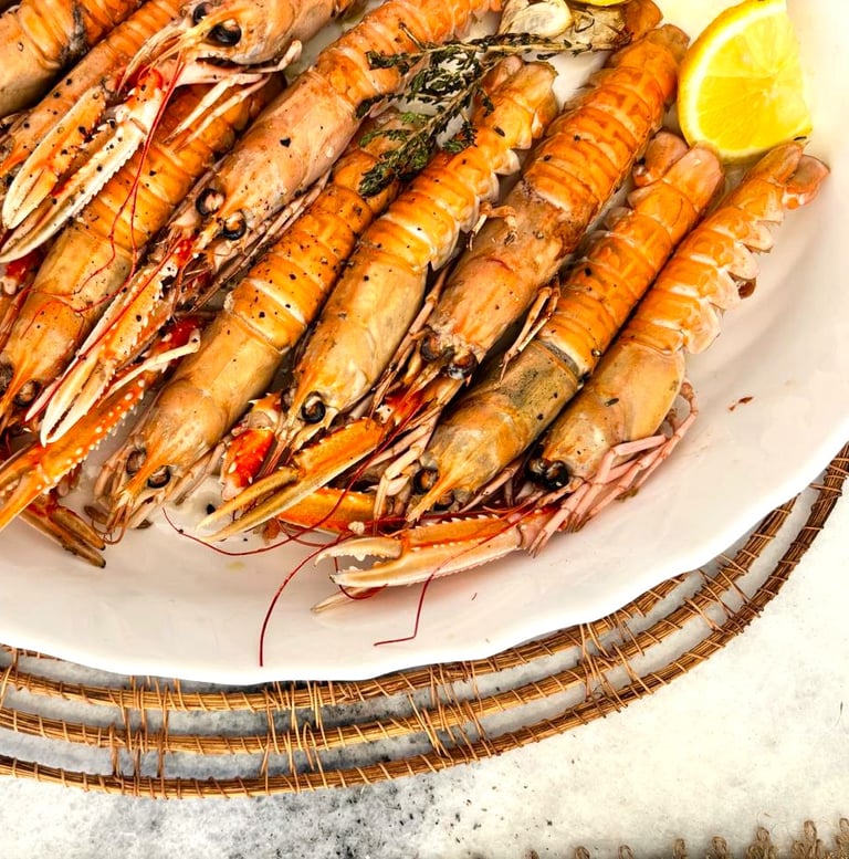 Grilled fresh langoustines prepared by villa eats private chefs Naxos served at a villa in Naxos