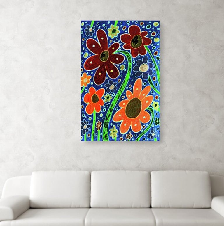 Digital image of a canvas print hanging on a wall above a couch. 