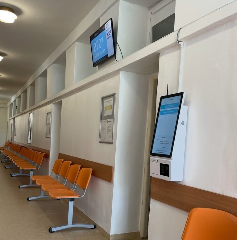 a long row of chairs in a hospital