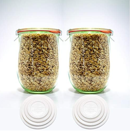 Set of 2 Weck 1-liter tulip glass jars with glass lids, rubber gaskets, and stainless steel clips.
