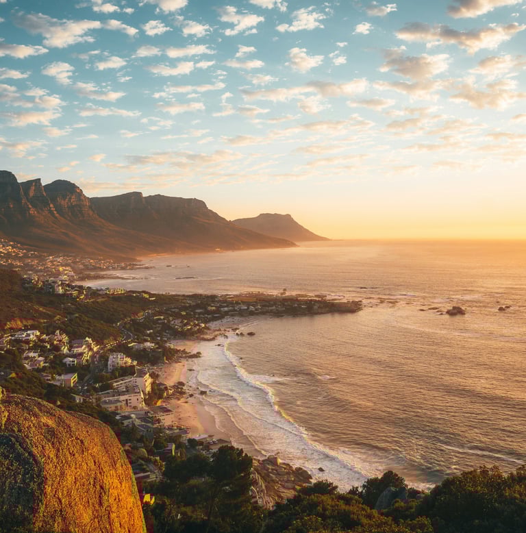 Clifton coastline at sunset representing Phillips Synergy’s Cape Town base