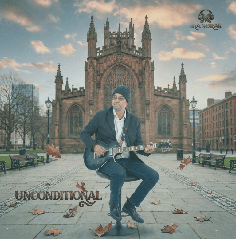 cover art of the single Unconditional. mANDRAk with a guitar in front of Manchester Cathedral