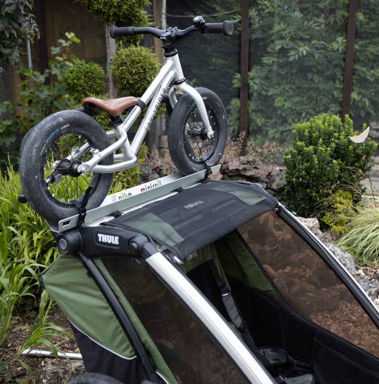 Thule-Fahrradanhaenger-Laufrad-Kinderfahrrad-Befestigung-Halterung-Spazieren-Woom-Early Rider-Pucky