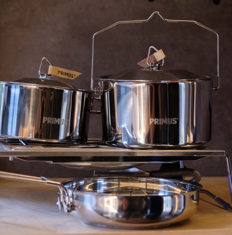 Stainless steel Primus camping cookware.