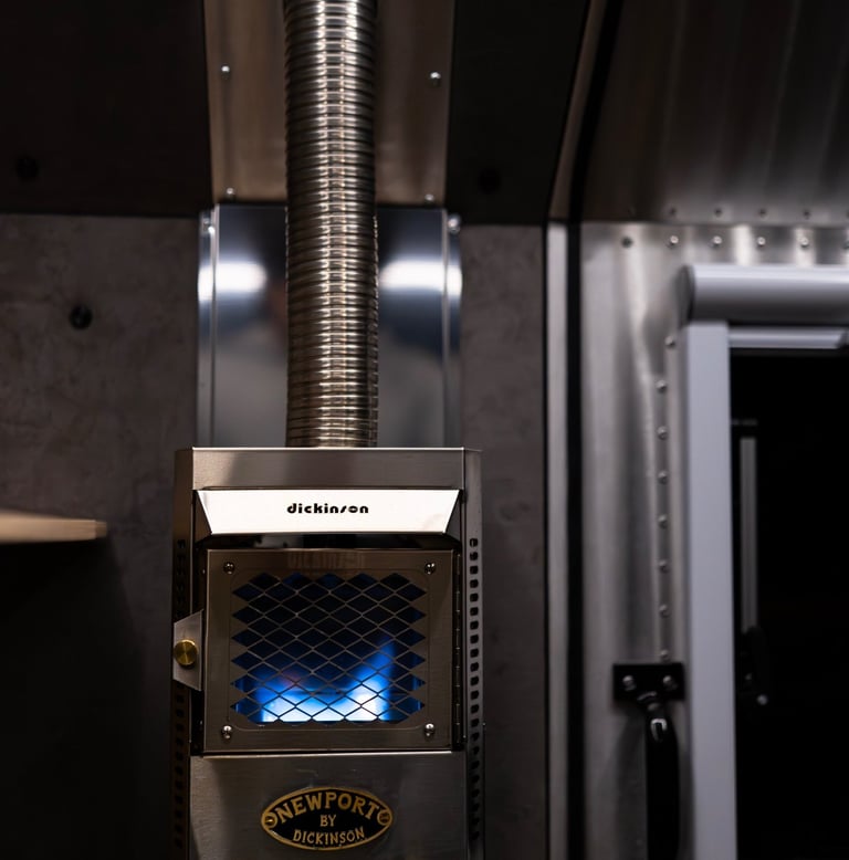 Dickinson propane heater mounted inside a Kimbo Camper.