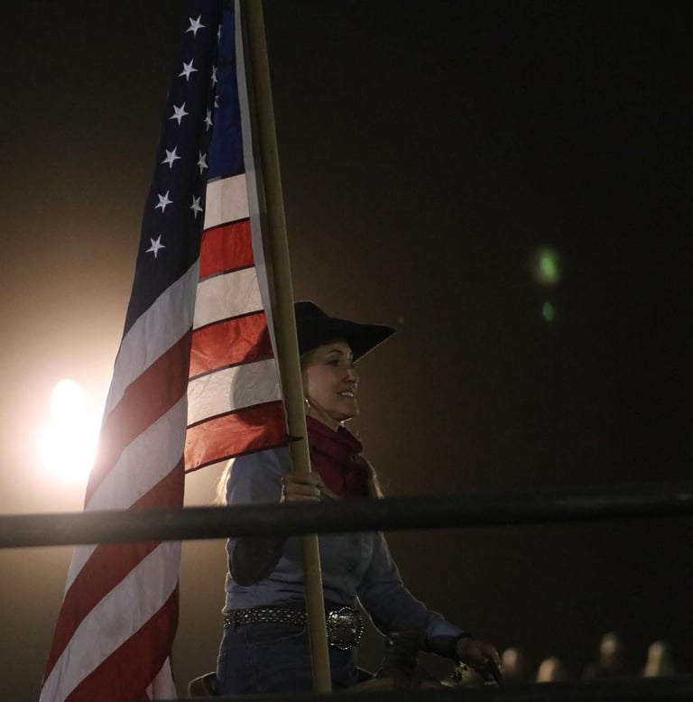 rodeo woman with US flag