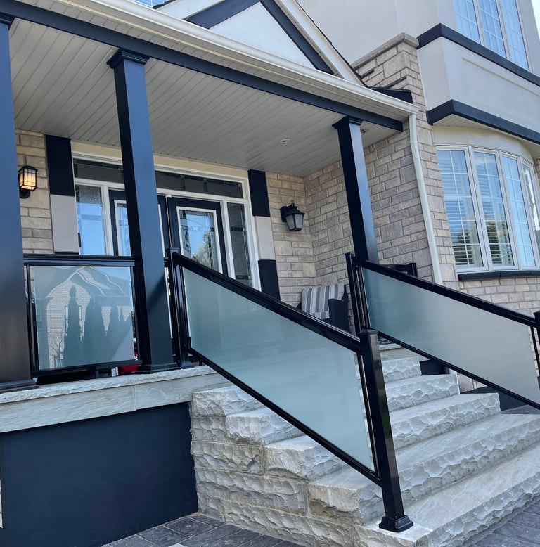 frosted glass railings with columns in driveway