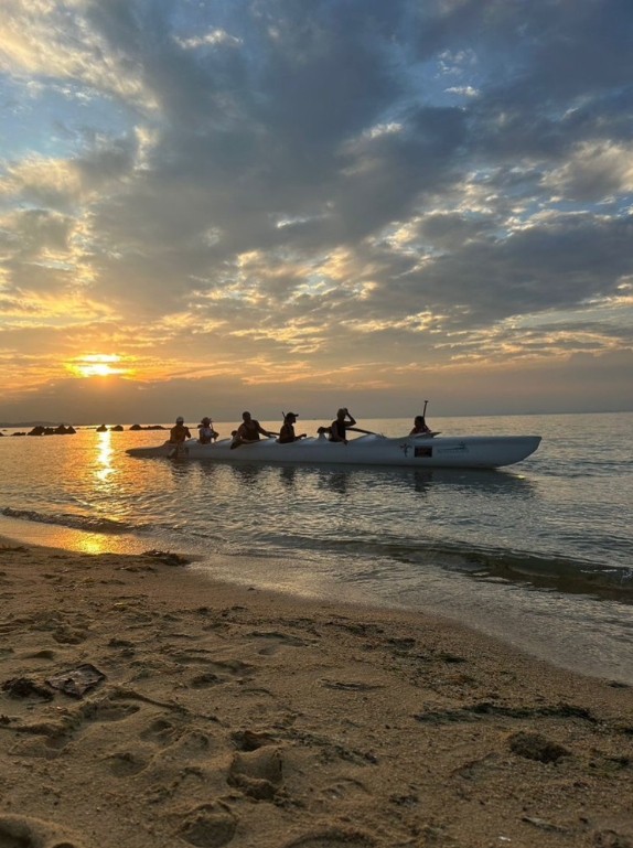 6 seater paddlers at sunset