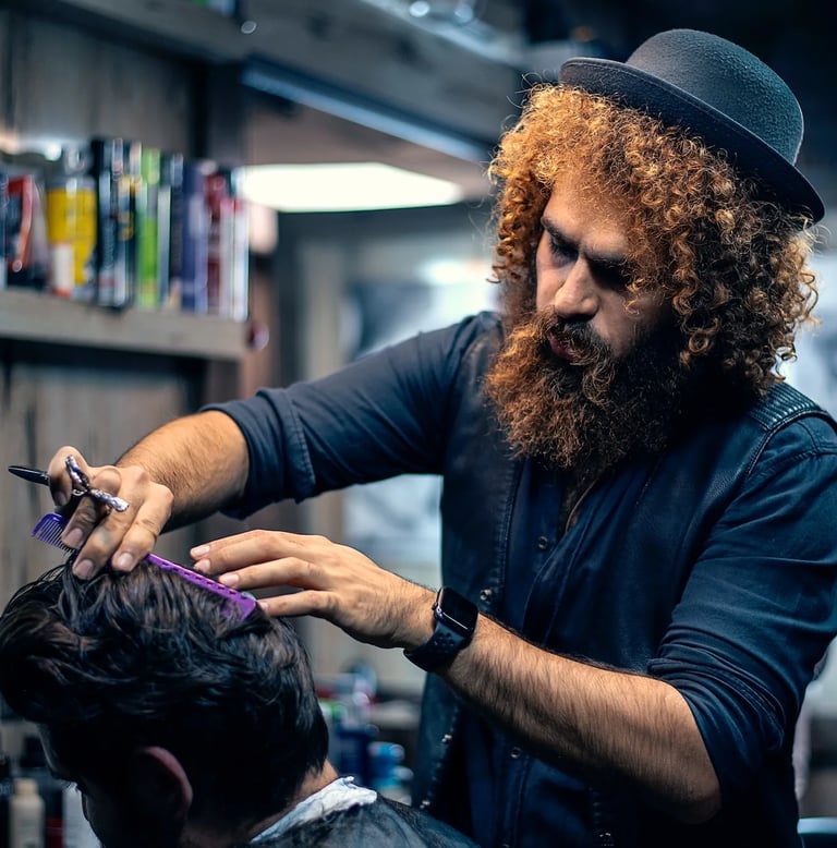 a man with a beard and a hat on his head