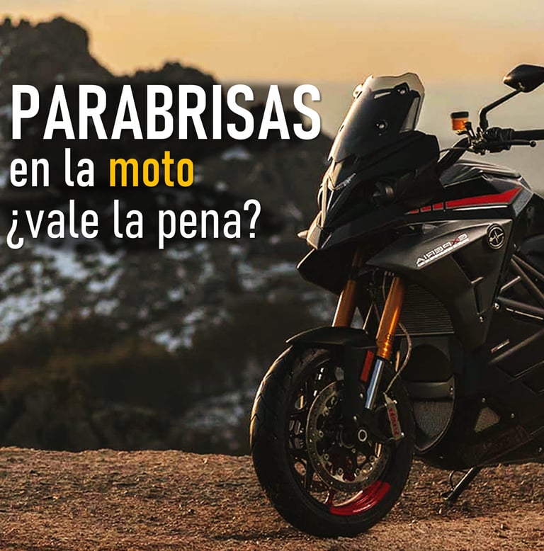 a motorcycle parked on a hill with a mountain in the background