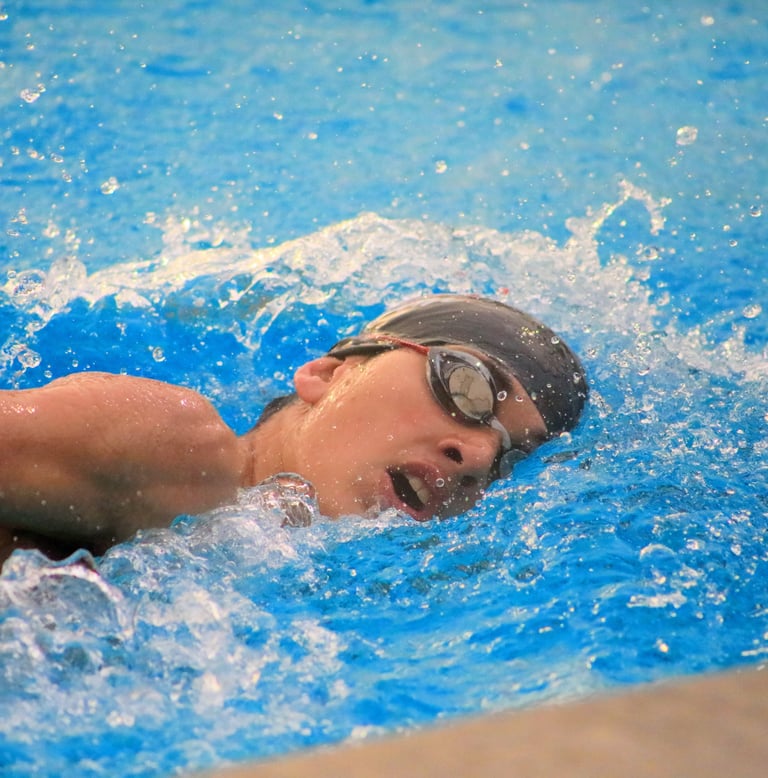 Sports Photo of Swimmer Cutting Through the Water
