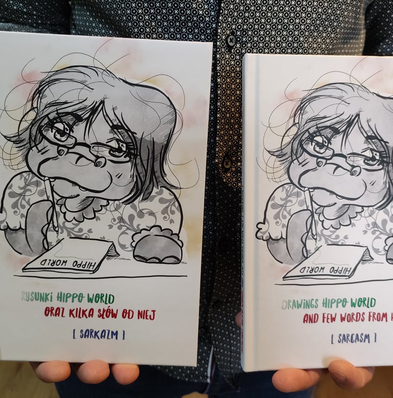 a person holding two cards with a drawing of a girl