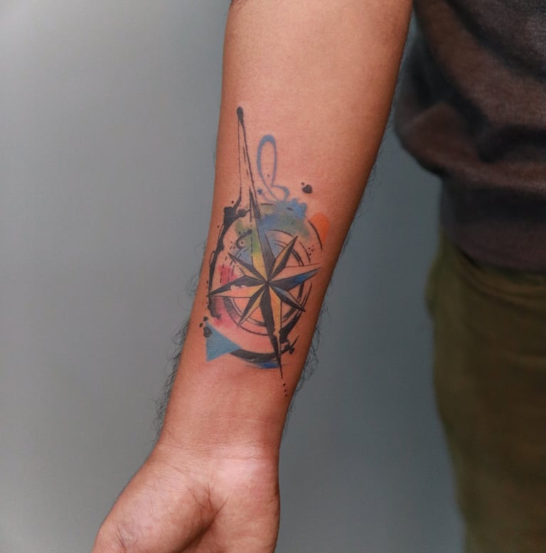 Watercolor abstract Compass tattoo by Dudo's Tattoos Hyderabad