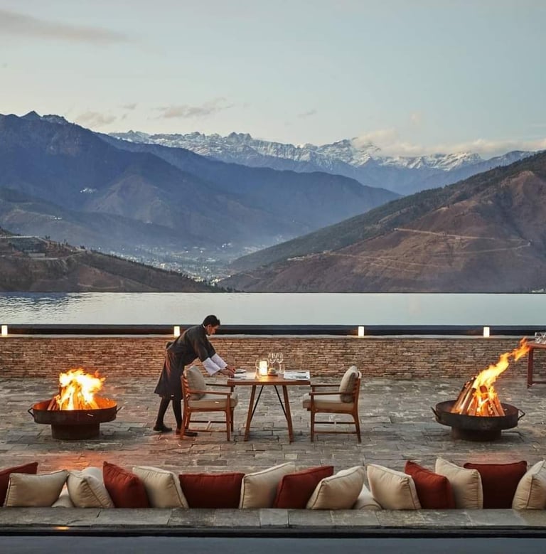 Six_Senses_Thimphu_Lodge_outdoor_dining_with_the_view_of_snow_capped_mountain_at_the_backdrop