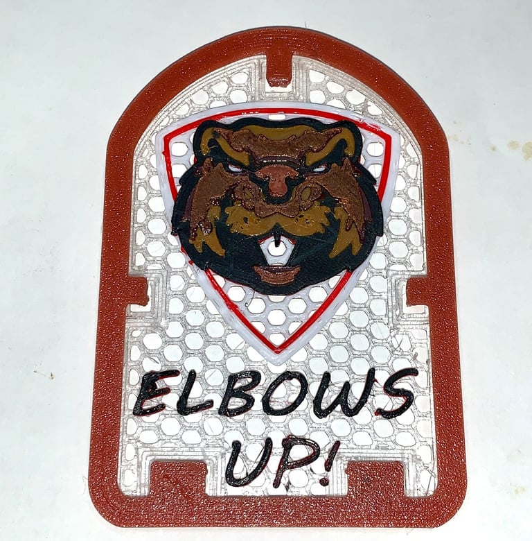 [breathe] mask decoration with a stern looking beaver head and the slogan "Elbows Up!" 