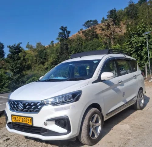 kumaoni tour & travels Ertiga taxi 