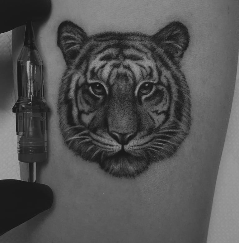 a detailed tiger tattoo on the arm, micro realism tattoo artists portfolio