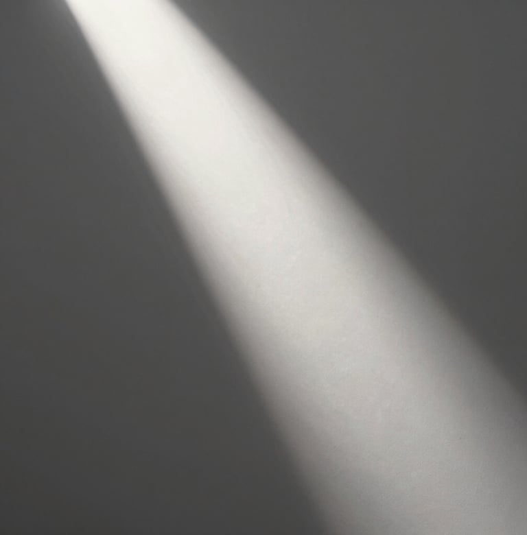 An abstract, museum-quality photographic study of light hitting a white canvas. A sharp beam of light creates a diagonal line across the off-white surface, transitioning into deep gray shadows. Sophisticated and minimalist aesthetic.