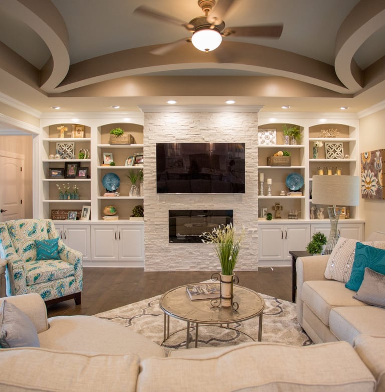 Cozy custom living room with fireplace and built-in shelves in Kane County home