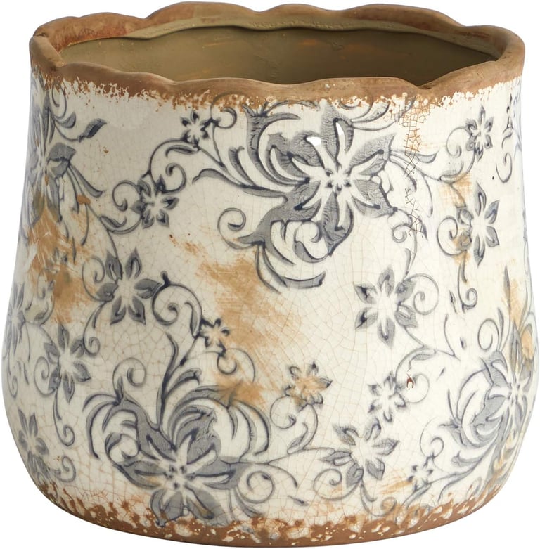 Vintage white and blue floral ceramic planter with a crackle glaze finish for indoor plants.