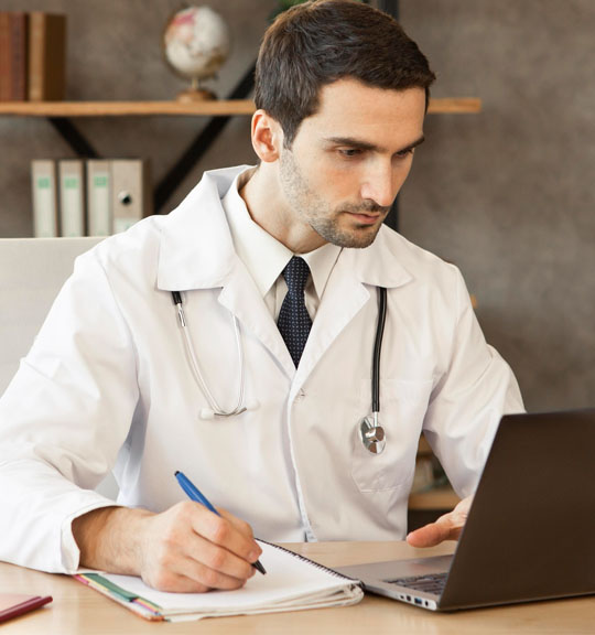 doctor writing