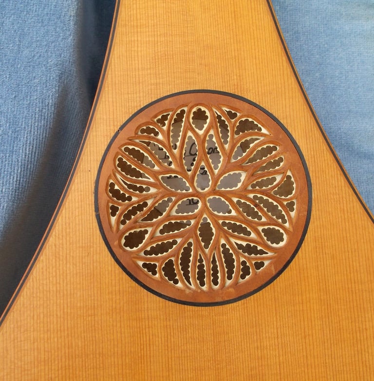 Gittern rose in pearwood and parchment