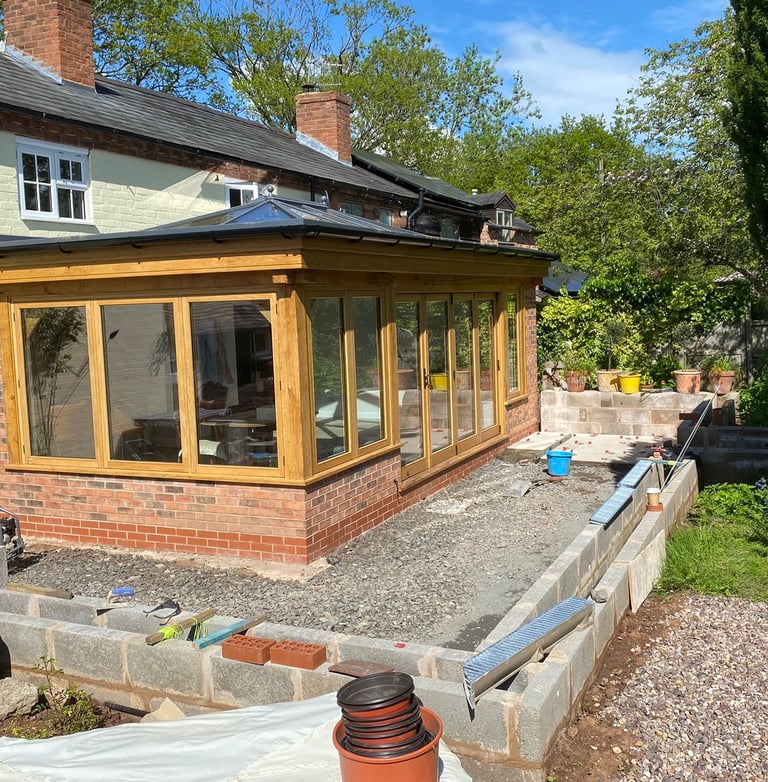 conservatory and wall built by Lakes building and plastering services