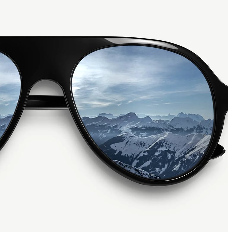 a pair of sunglasses with a mountain view of a mountain range