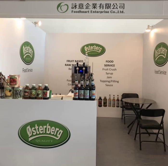 Osterberg food service booth featuring fruit syrups, crushes, and jam raw materials at a trade show.