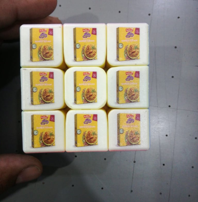 Intricate UV printing on small cubes for corporate promotional items
