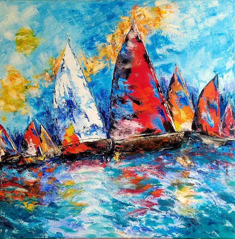 une course de voiliers dont les voiles colorées se reflètent dans l'eau