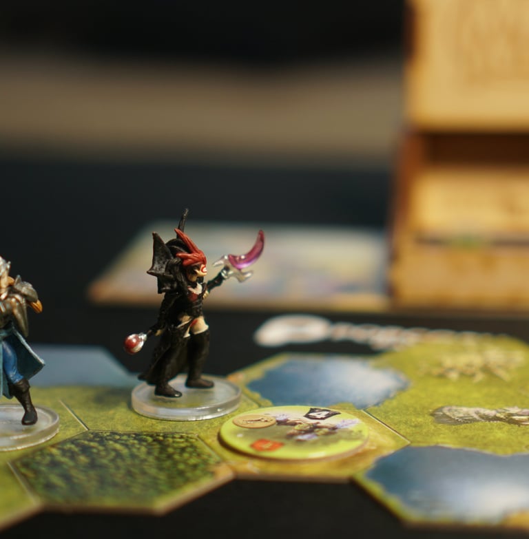 two knight models on a board game 