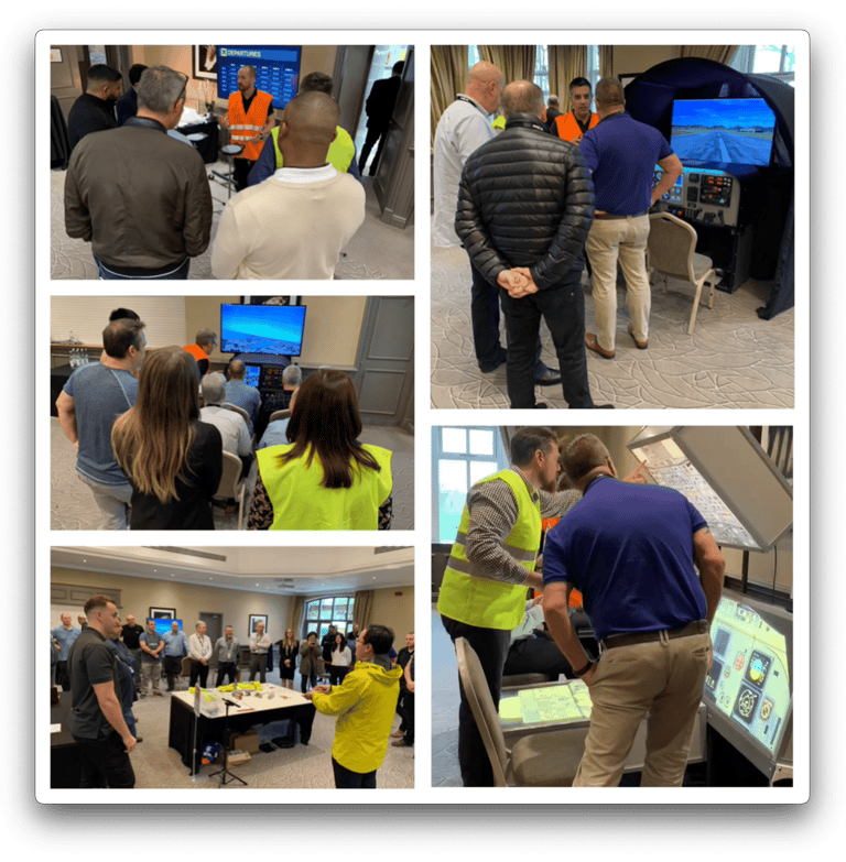 a group of people standing around a table