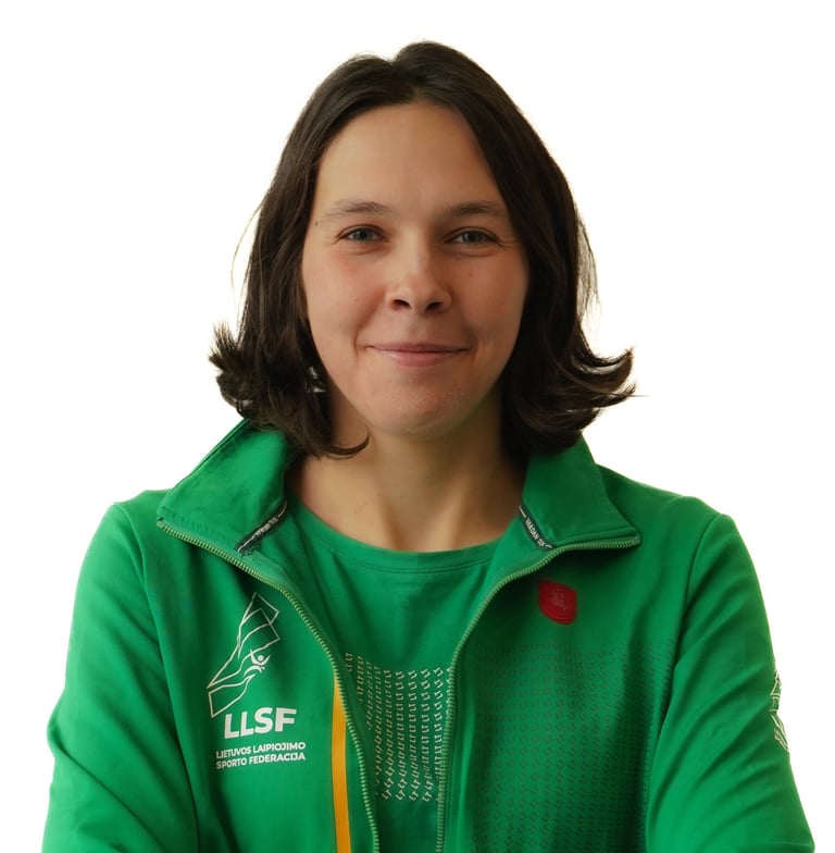 a woman in a green jacket