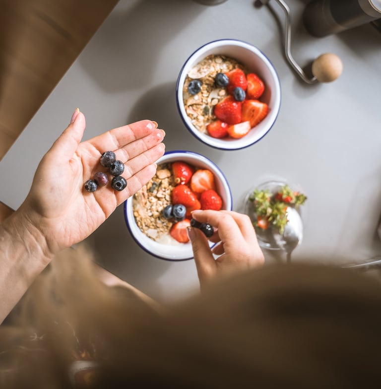 photo of vibrant breakfast fruit bowl being prepared 
