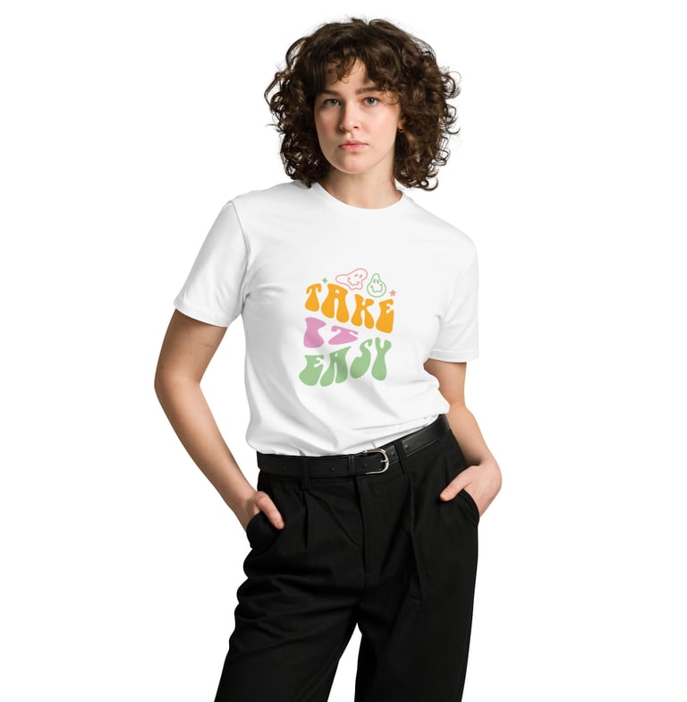 a woman in a white shirt and black pants