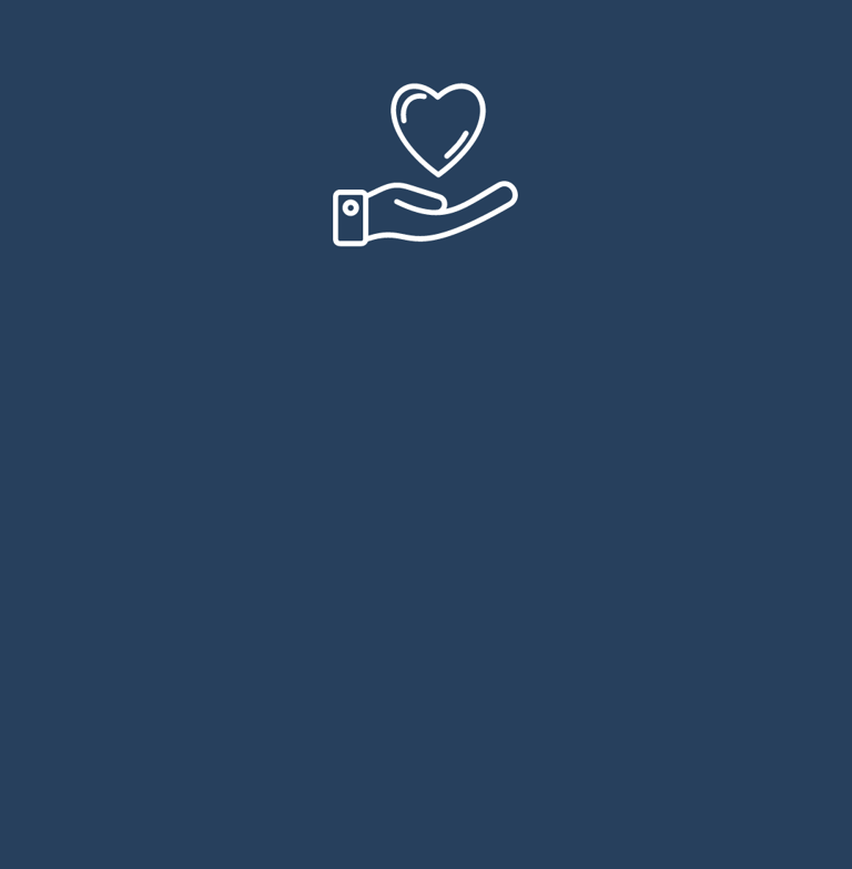 a hand holding a heart shaped object