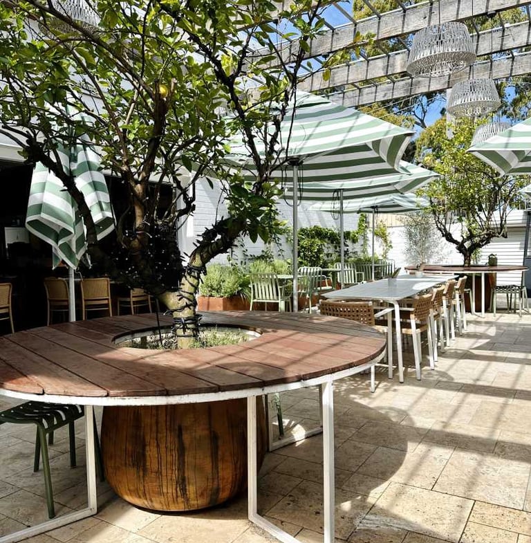 a table with a wooden table and chairs