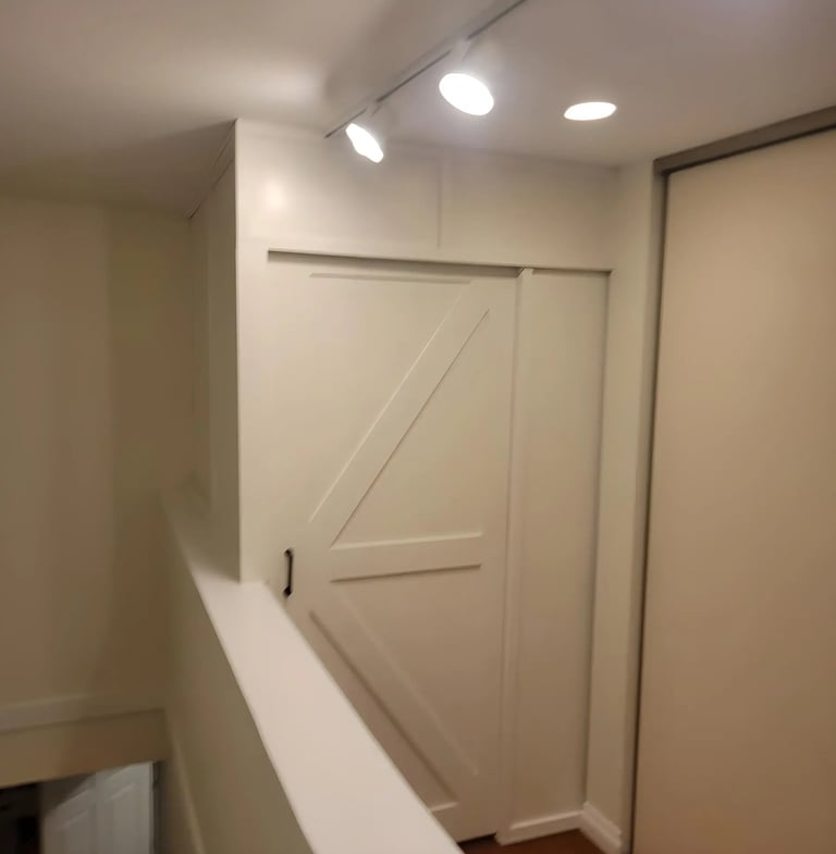 a white door with a white door and a white door